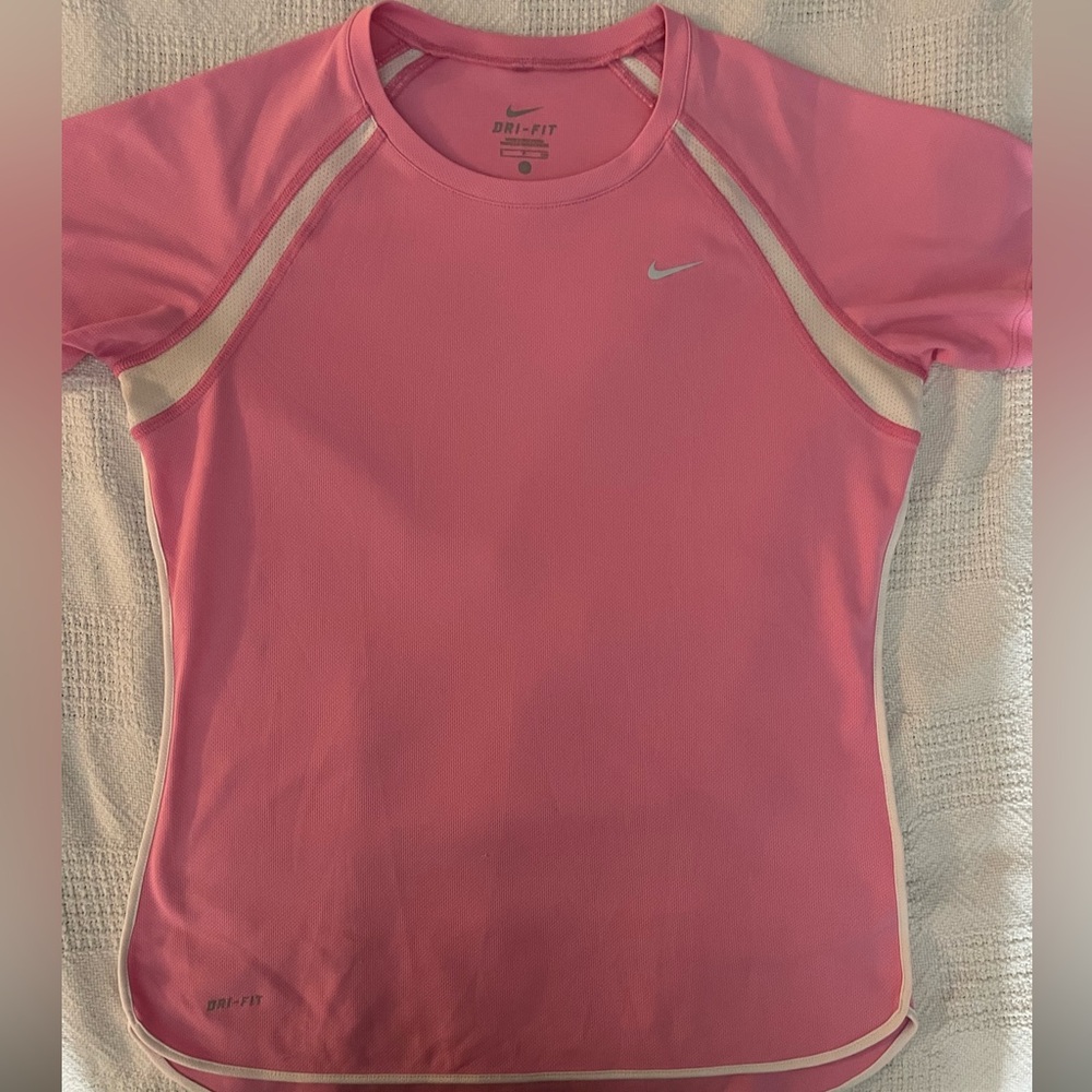 Women’s small Nike Dri-fit pink shirt. New condition. Smoke free home.